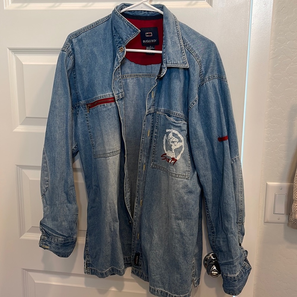 Distressed jean jacket